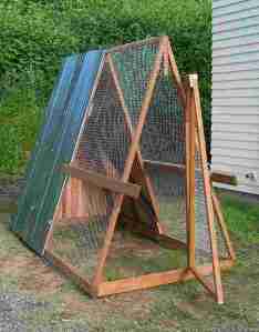 Finished product with roofing & chicken wire screen.
